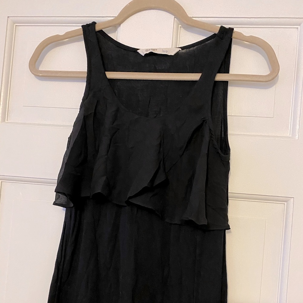 Black flouncy top.